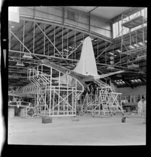 Aeroplane under construction in hangar, National Airways Corporation (NAC) Press Forum, Christchurch