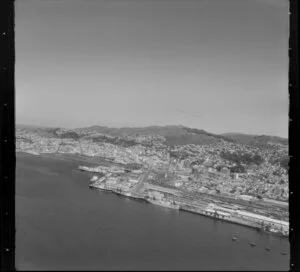 Wellington, including harbour and ships docked at wharves