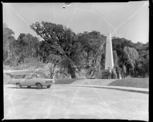 Family visiting Kerr Point memorial, Haast