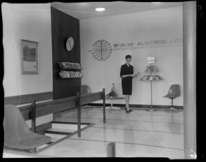 Pan American World Airways office interior [Auckland?] including an unidentified member of staff