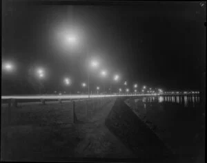 Lights on motorway at night, showing Harbour Bridge Toll Plaza, Auckland