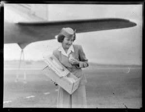 Stewardess, Mrs McFarlane, with baby chicks