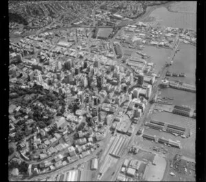 High altitude view of Auckland central city and wharves