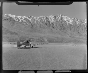 Percival Proctor aircraft, Otago Aero Club, with The Remarkables in the background