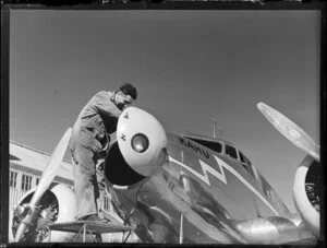 Lockheed Electra aeroplane, Kahu, undergoing maintenance at Milson aerodrome, Palmerston North