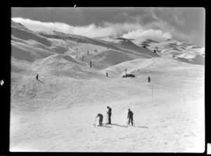 Skiers on Coronet Peak