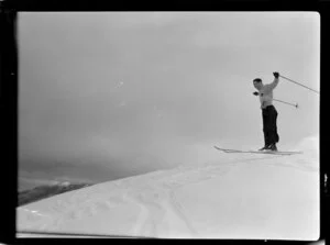 Unidentified man ski-ing