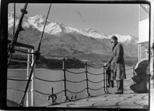 Unidentified man on board SS Earnslaw, Lake Wakatipu including The Remarkables