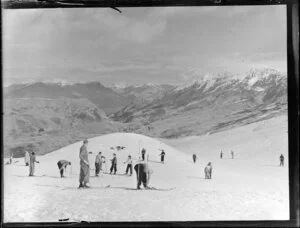 Skiers on Coronet Peak