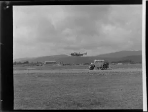 New Zealand National Airways Corporation, Lodestar aircraft flying over new airstrip at Paraparaumu Airport