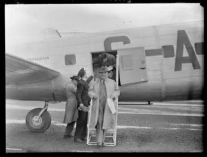 Lord and Lady Nathan alighting from a BOAC (British Overseas Airways Corporation) Lancaster aeroplane