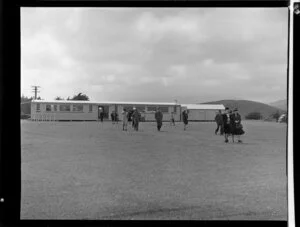 New Zealand National Airways Corporation, passengers leaving the administration building at Paraparaumu Airport