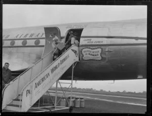 Passengers disembarking from Pan American World Airways Clipper Ocean Express