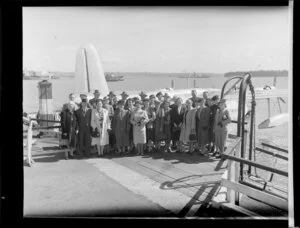 Power Boards conference group standing at TEAL flying boat dock