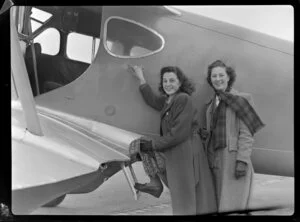 Two passengers boarding an aeroplane, Canterbury Aero Club