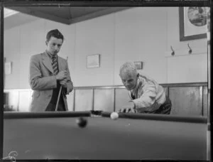 Messrs T Law and E V West, playing billiards, Palmerston North, Middle Districts Aero Clubhouse