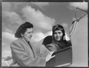 Miss S Murphy and Miss M Gale, (seated in plane), Palmerston North, Middle Districts Aero Club pilots