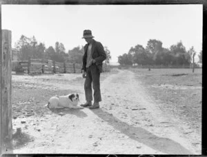 Unidentified man and dog, South Westland