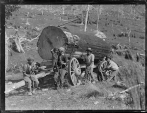 Timber workers and loaded log cart