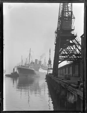 The ship, Rangitane, coming in to berth at a wharf in Auckland