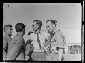 J Bremner, 2nd from left, Arthur Dickson on the right, Otago Aero Club