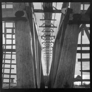 Aerial coal flume from mainland to Seal Island near the mouth of Fox River, viewed from below, Buller District