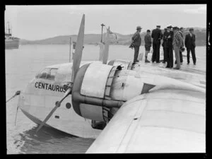 Group of men, talking to the captain and crew of the flying boat, Centaurus, Dunedin