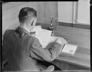 Leo Lemuel White at his desk