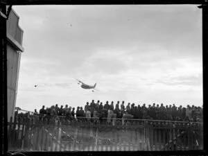 Arrival of Tasman Empire Airways Ltd seaplane, Aotearoa at Mechanics Bay, Auckland