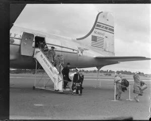 Passengers disembarking from Pan American World Airways aeroplane Clipper Red Jacket