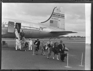 Passengers disembarking from Pan American World Airways aeroplane Clipper Red Jacket