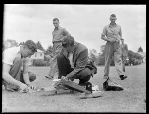 Mr Pepperell junior and father V Pepperell working on their model aeroplane, Auckland Aero Club