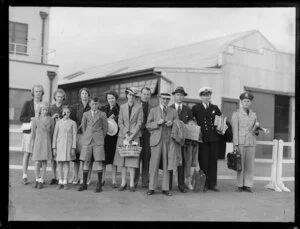 Group of men, women and children, flying boat Awarua, Pacific flight