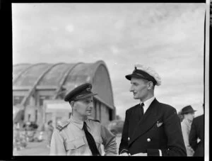 Station signal officer at Ohakea, Flight Lieutenant J White and Mr C J Paterson, Qantas