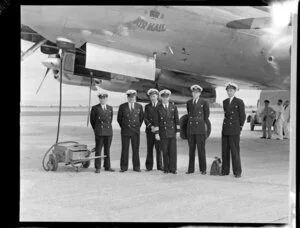 Crew of the Constellation aircraft from left to right, Mr Stark, Mr Rowe, 1st officer Edwards, Captain Ritchie, Mr R F Lander, Mr C J Patterson