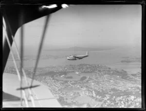 The seaplane Centaurus, flying above Auckland, New Zealand, Imperial Airways Ltd