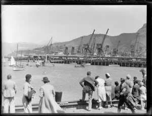 Crowd welcoming the flying boat, Centaurus, Lyttelton Harbour