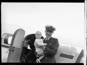 Unidentified baby with the [captain?] of the flying boat, Centaurus, Wellington
