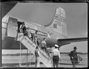 Passengers disembarking Pan American Airways aircraft, Clipper Argonaut