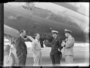 Left to right Messrs H Power (Trans Australia Airlines engineer), B Morgan (Trans Australia Airlines engineer), John Chapman (Skipper), Captain P Le Couter (Tasman Empire Airways Ltd)