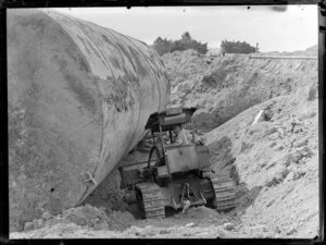 Air force surplus, large underground petrol tank being uncovered at Whenuapai, Pan American World Airways (PAWA)
