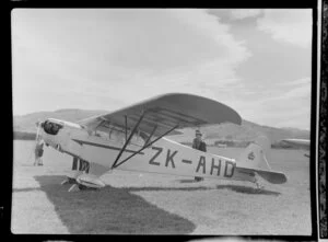 Piper J-3 Cub aircraft ZK-AHD, owner J R Franklin of [Waipukurau?], RNZAC (Royal New Zealand Aero Club) pageant event, Dunedin.