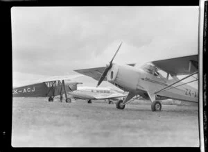 Three aircrafts, Blackmore De Soutter, De Havilland Dove and an Auster Autocrat, Paraparaumu, Kapiti Coast