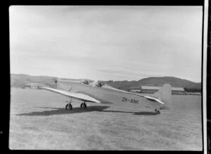 Miles Magister aircraft ZK-ANK, owner [John Gamble?], RNZAC (Royal New Zealand Aero Club) pageant event, Dunedin