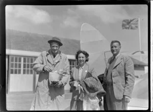 From left, Dr J C Hazeldine, Mrs Smith, John Smith, at the Royal New Zealand Aero Club pageant in Dunedin