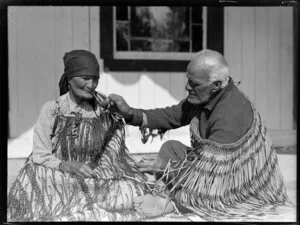 Kaumatua lighting the pipe for Kuia, Lake Rotoiti