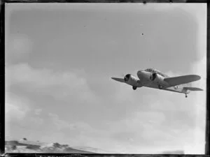 Cessna aircraft in flight, Mangere Aerodrome, Auckland