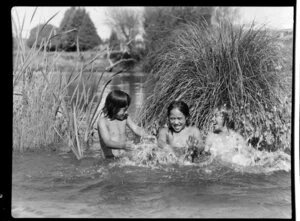 Maori children playing in the river, Waikato