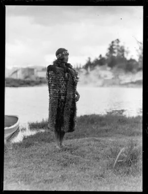 A Maori woman in costume, location unidentified