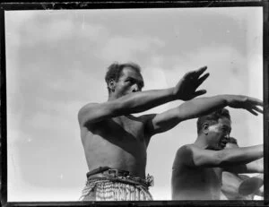 Maori men performing a waiata, location unidentified
